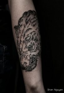 Tatouage loup sur avant-bras